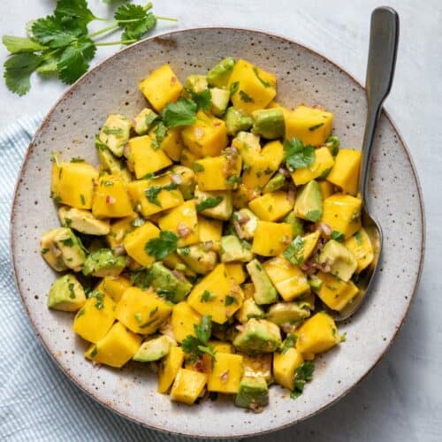 Mango avocado salad tossed with an easy vinaigrette