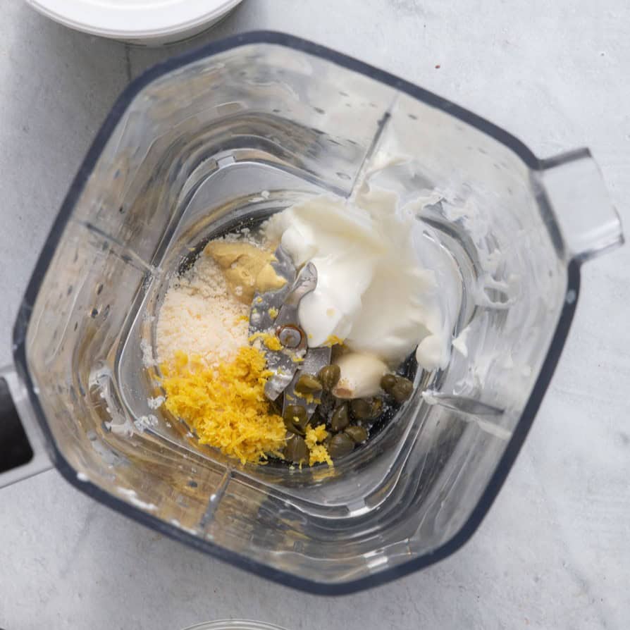 Dressing ingredients in small blender before blended.