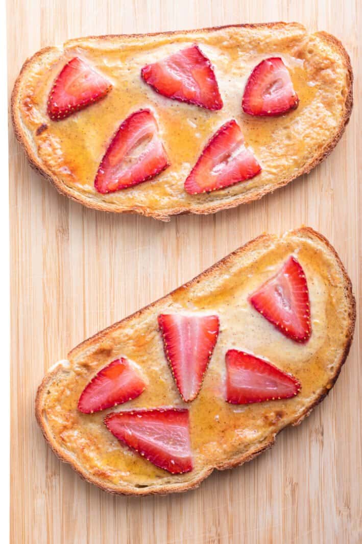 2 yogurt toasts topped with sliced strawberries