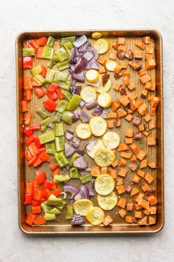 Roasted vegetables in a large roasting pan
