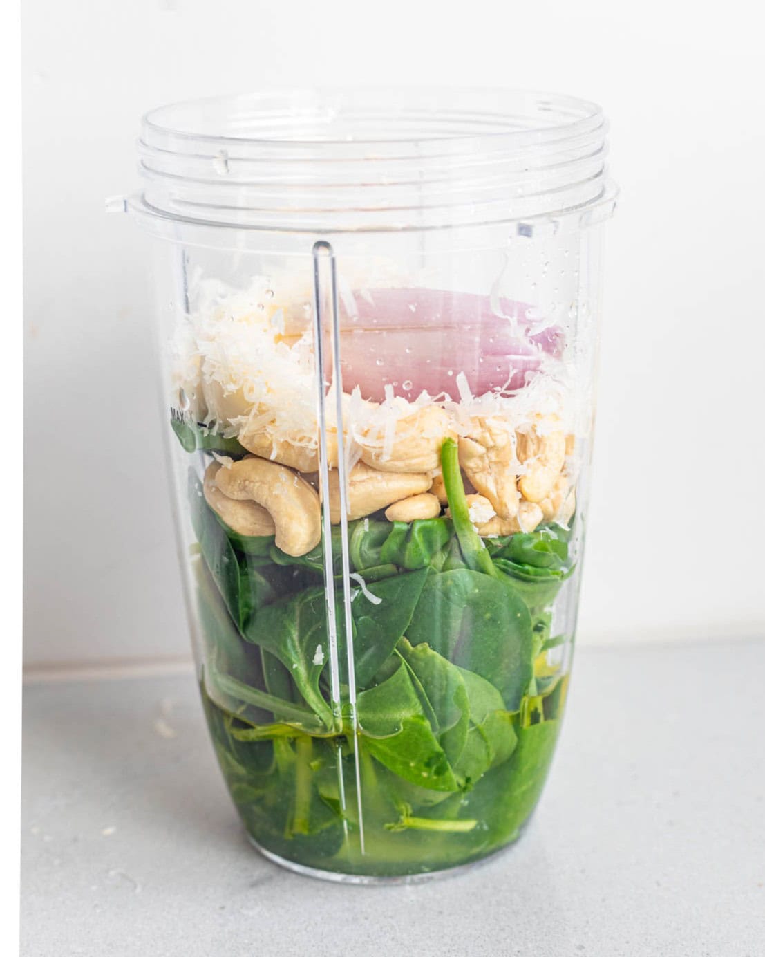 All of the dressing ingredients in a blender before blending.