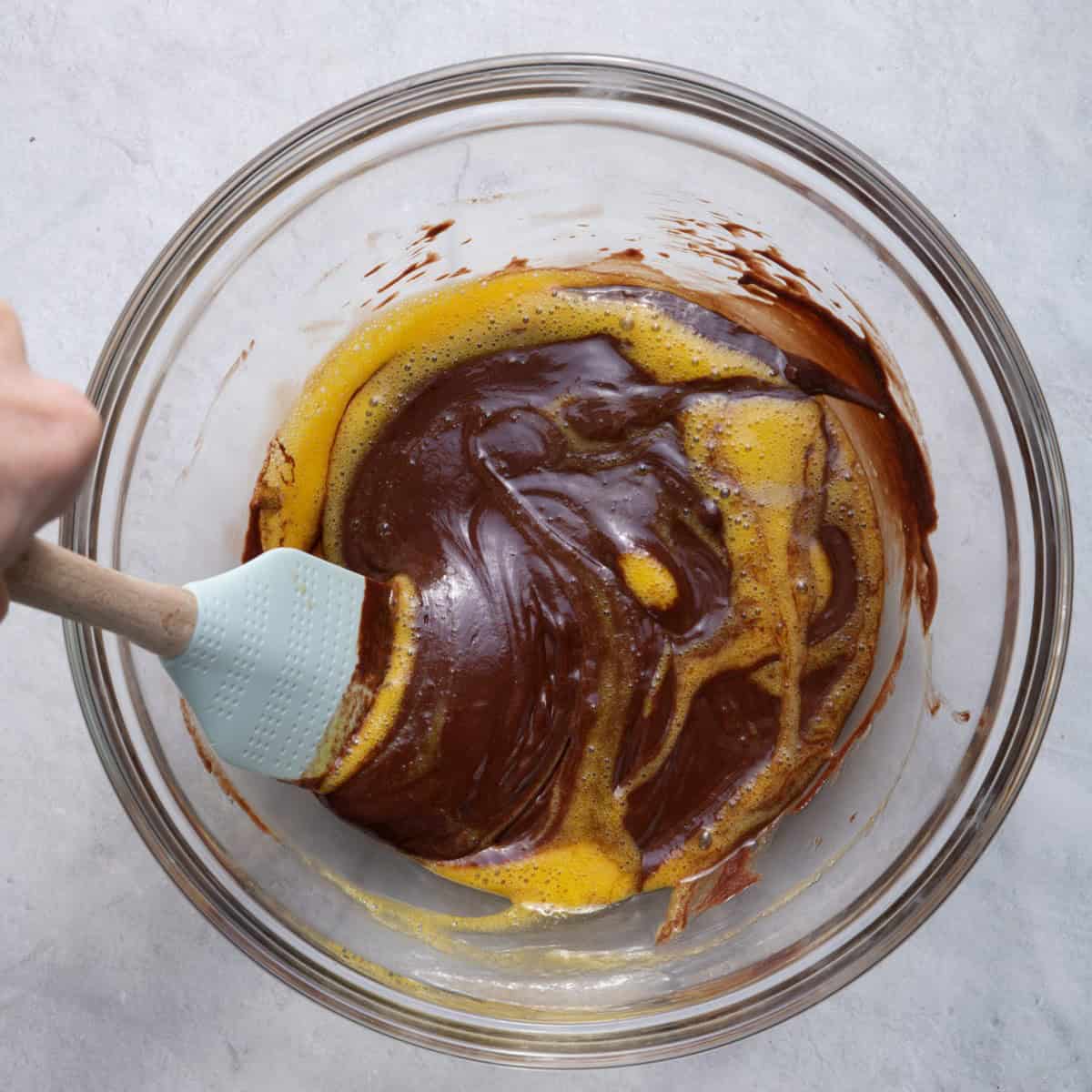 Egg yolks, vanilla and salt mixed into melted chocolate mixture.