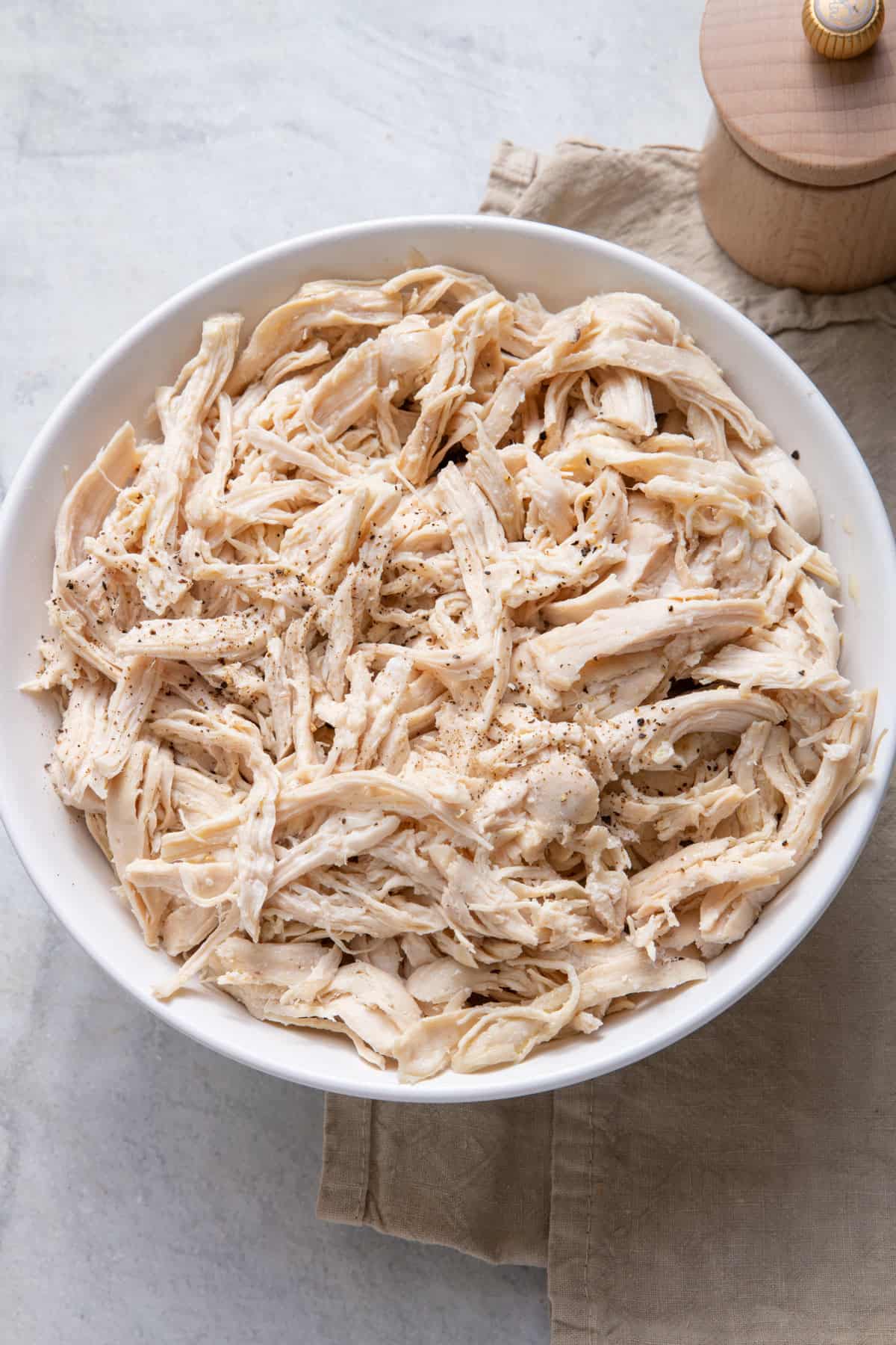 Large bowl of shredded chicken