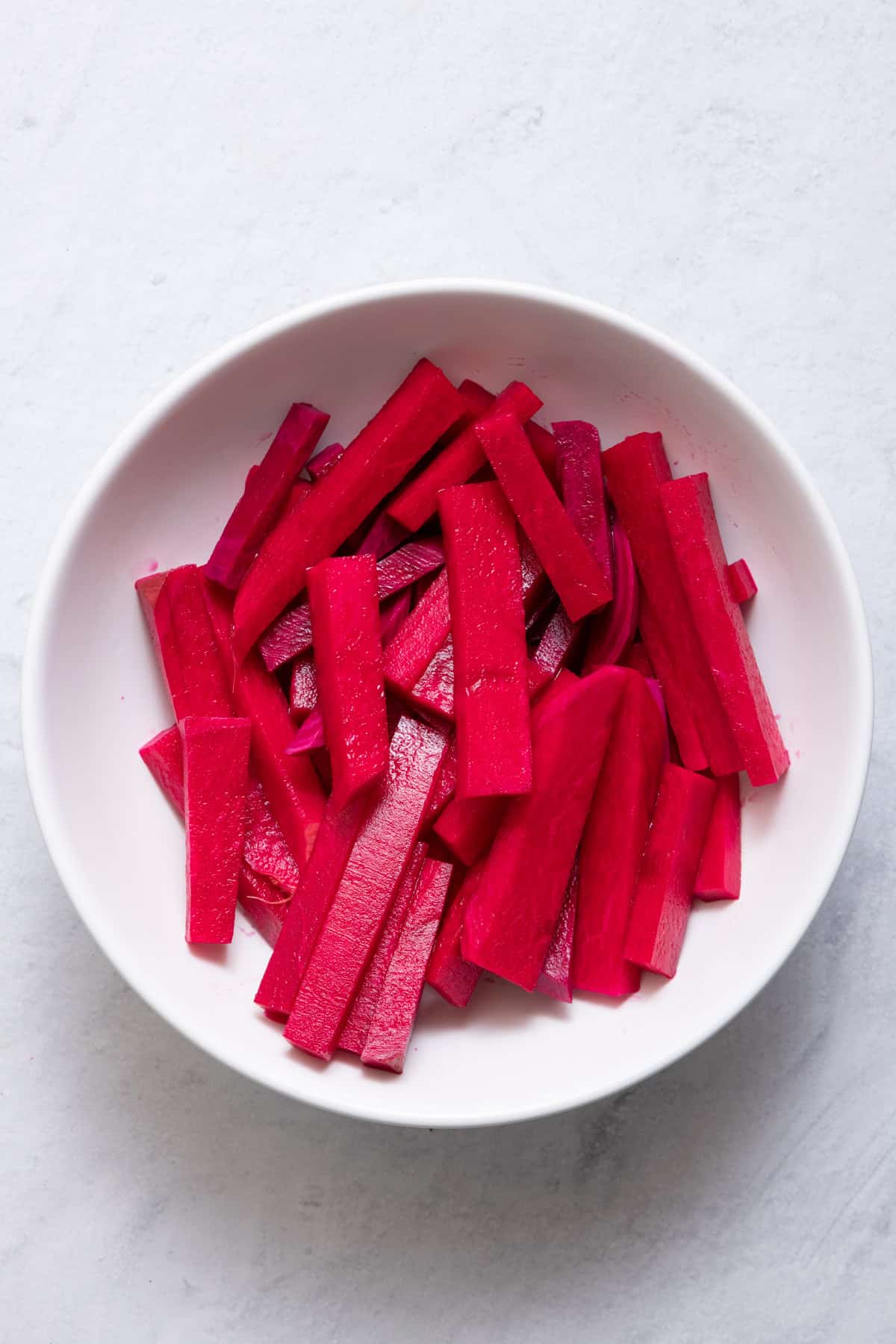 Large bowl of pickled turnips