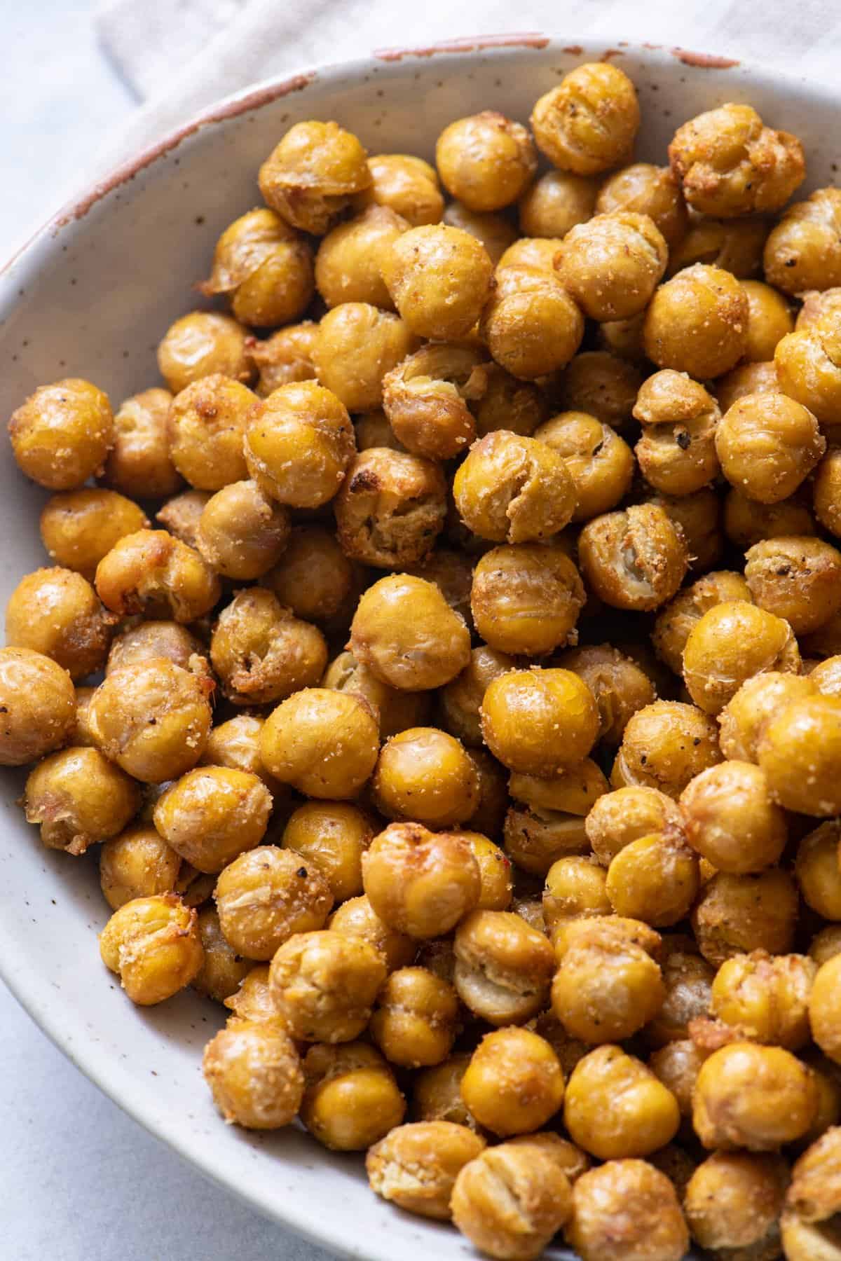 Close up of air fryer chick peas with seasoning.