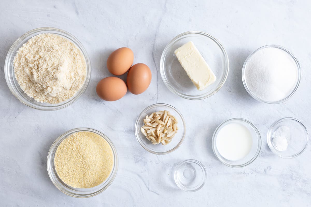 Ingredients for recipe: almond flour, semolina flour, baking powder, salt, btter, sugar, 3 eggs, slivered almond