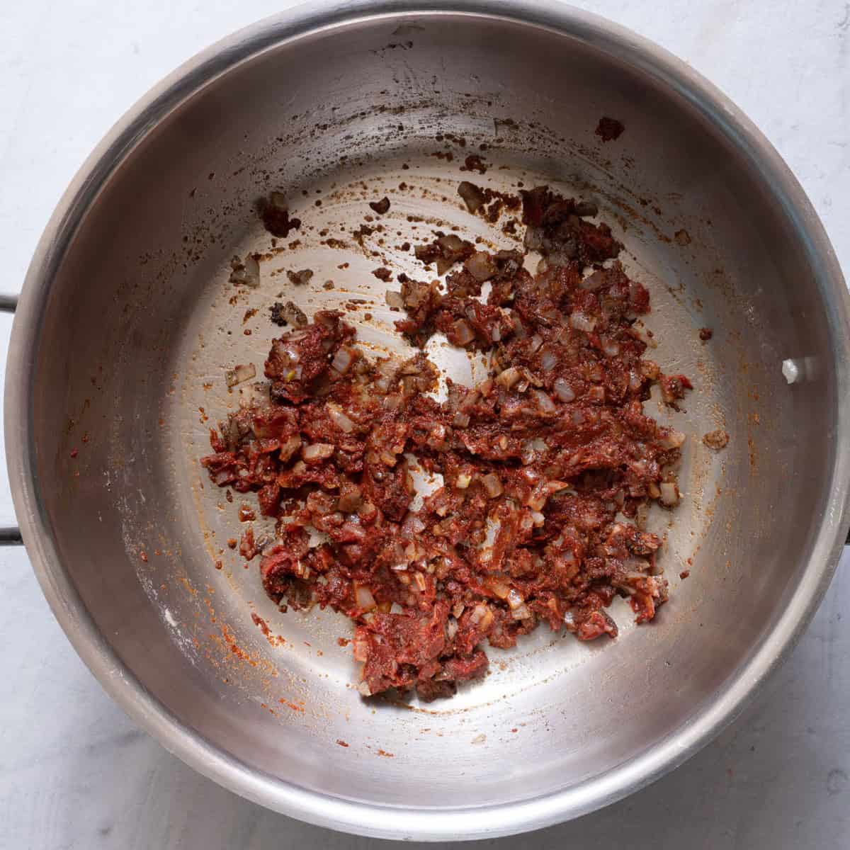 Tomato paste and spices mixed in.