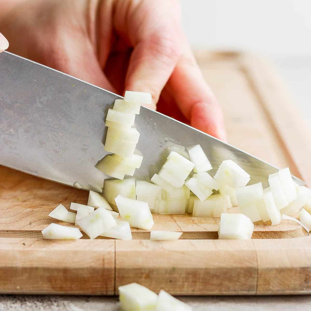 Cutting the slices into dices.
