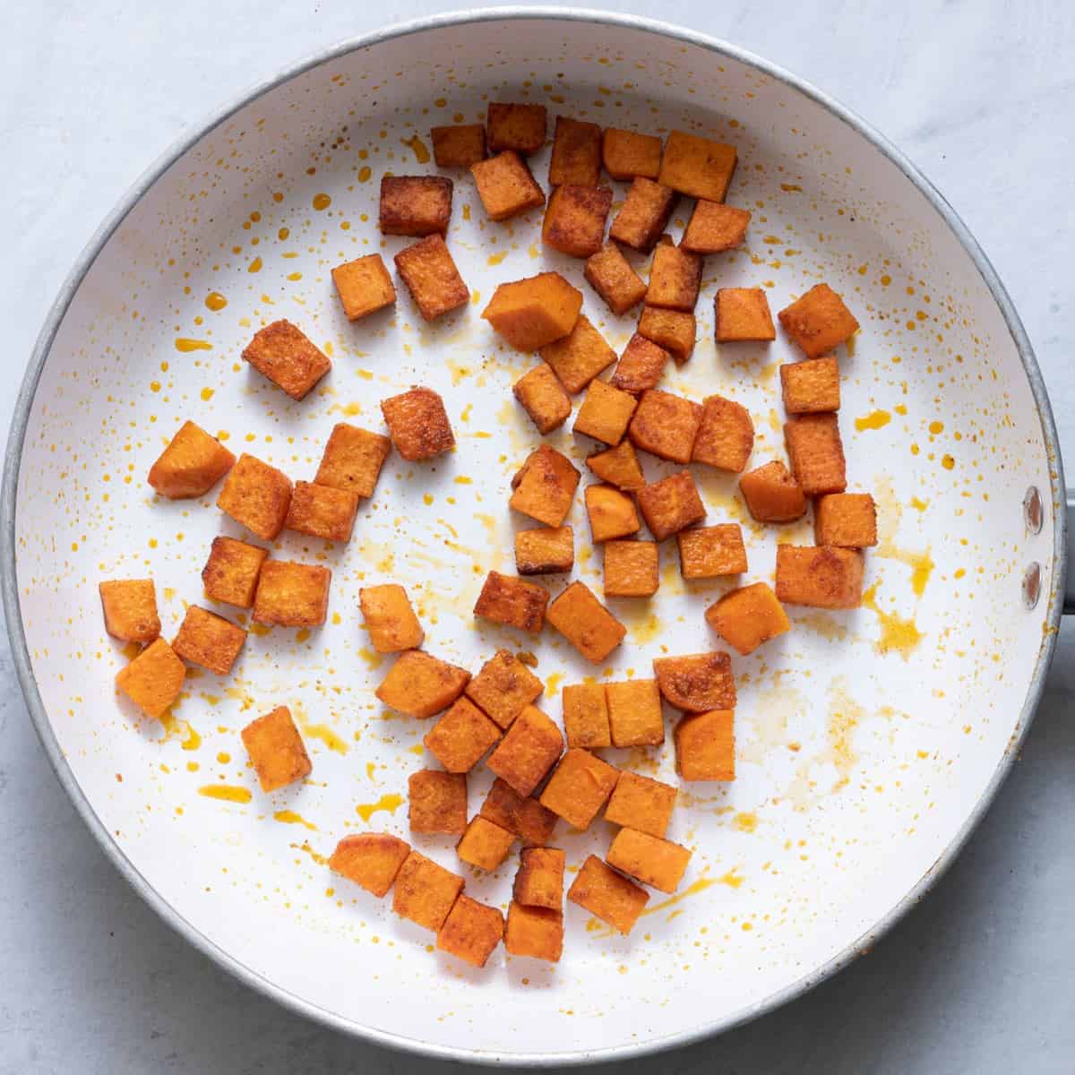 Cooked sweet potatoes on a pan.