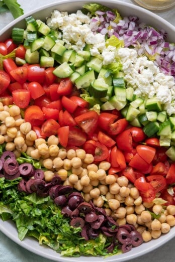 Mediterranean chopped salad assembled in a serving bowl.