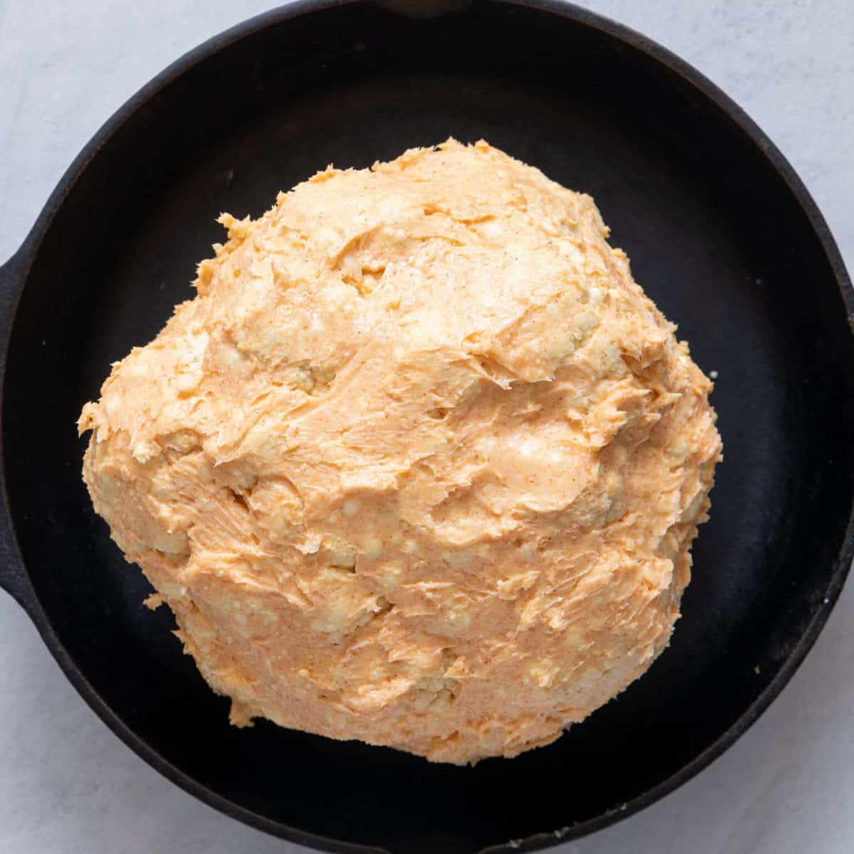 Cauliflower rubbed with softened butter.