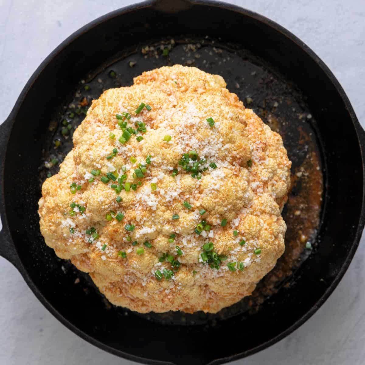 Cauliflower topped with parmesan cheese & chives.