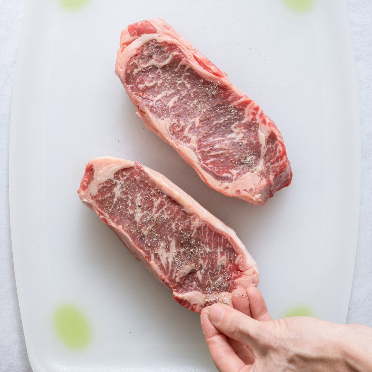 Season with salt and pepper.