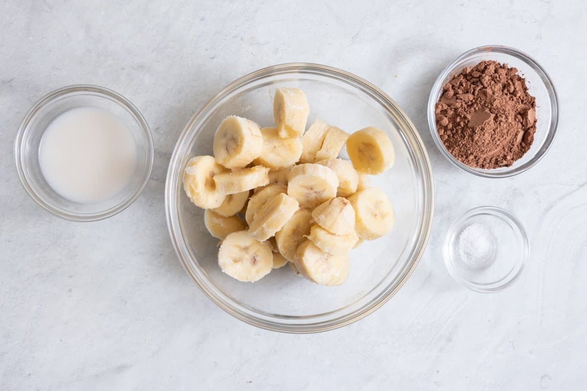 Ingredients for recipe: almond milk, bananas, cocoa powder, and salt.