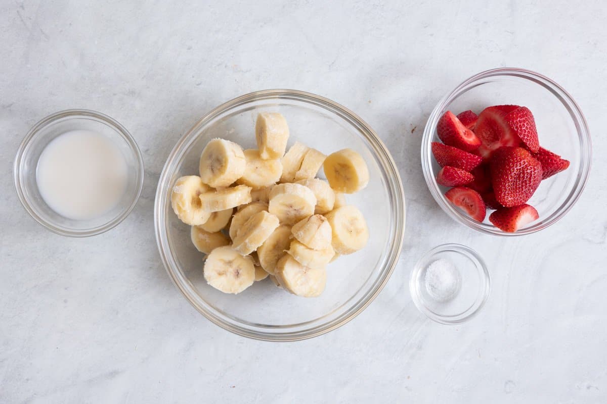 Ingredients for recipe: almond milk, bananas, strawberries, and salt.