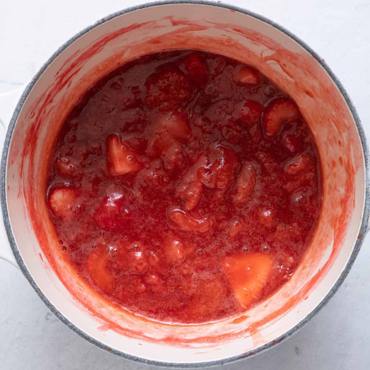 Strawberry sauce in saucepan after thickened.