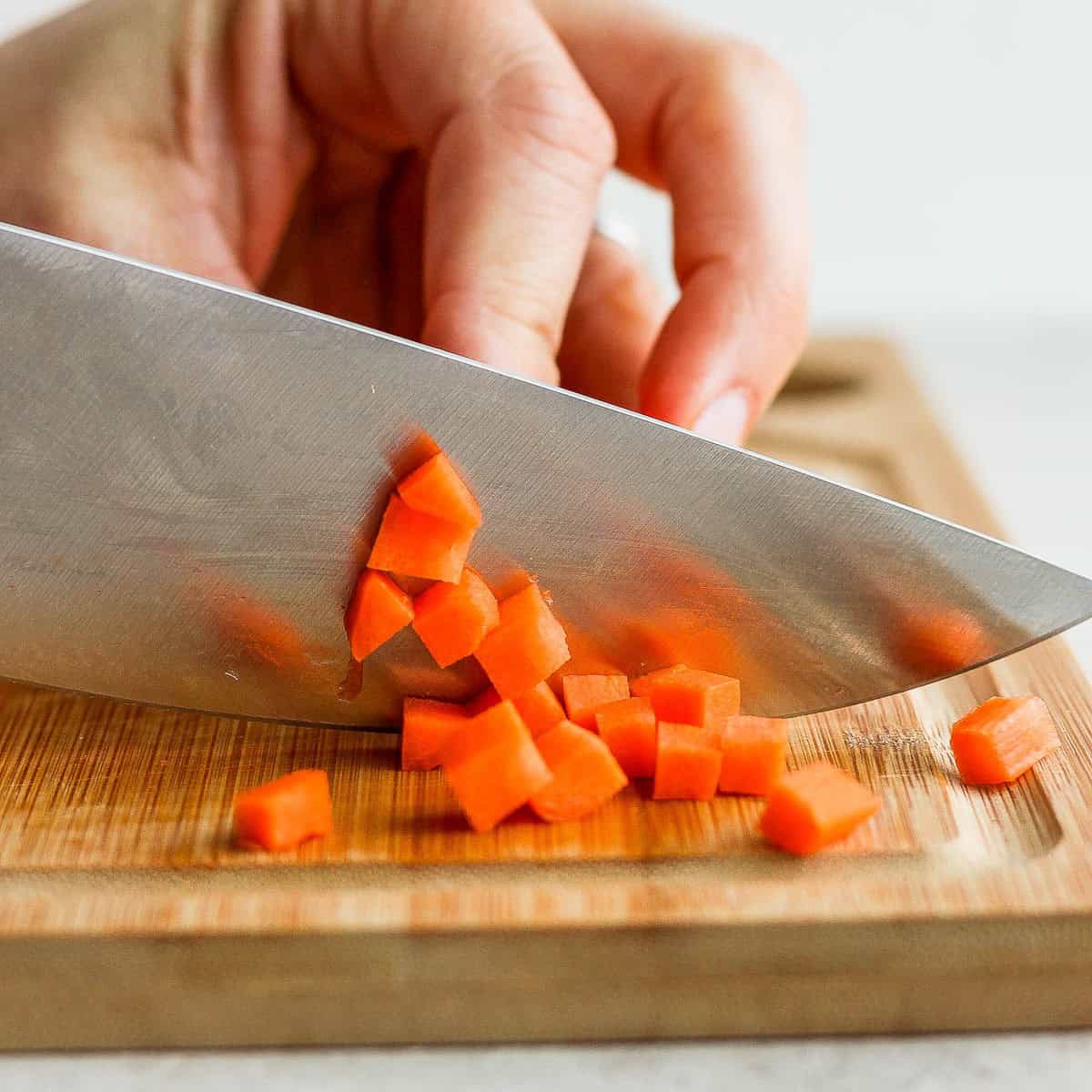 Cross cut the strips of carrot.