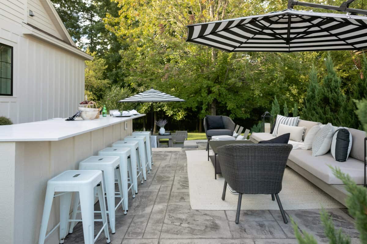 Outdoor kitchen, lounging area and steps to eating area