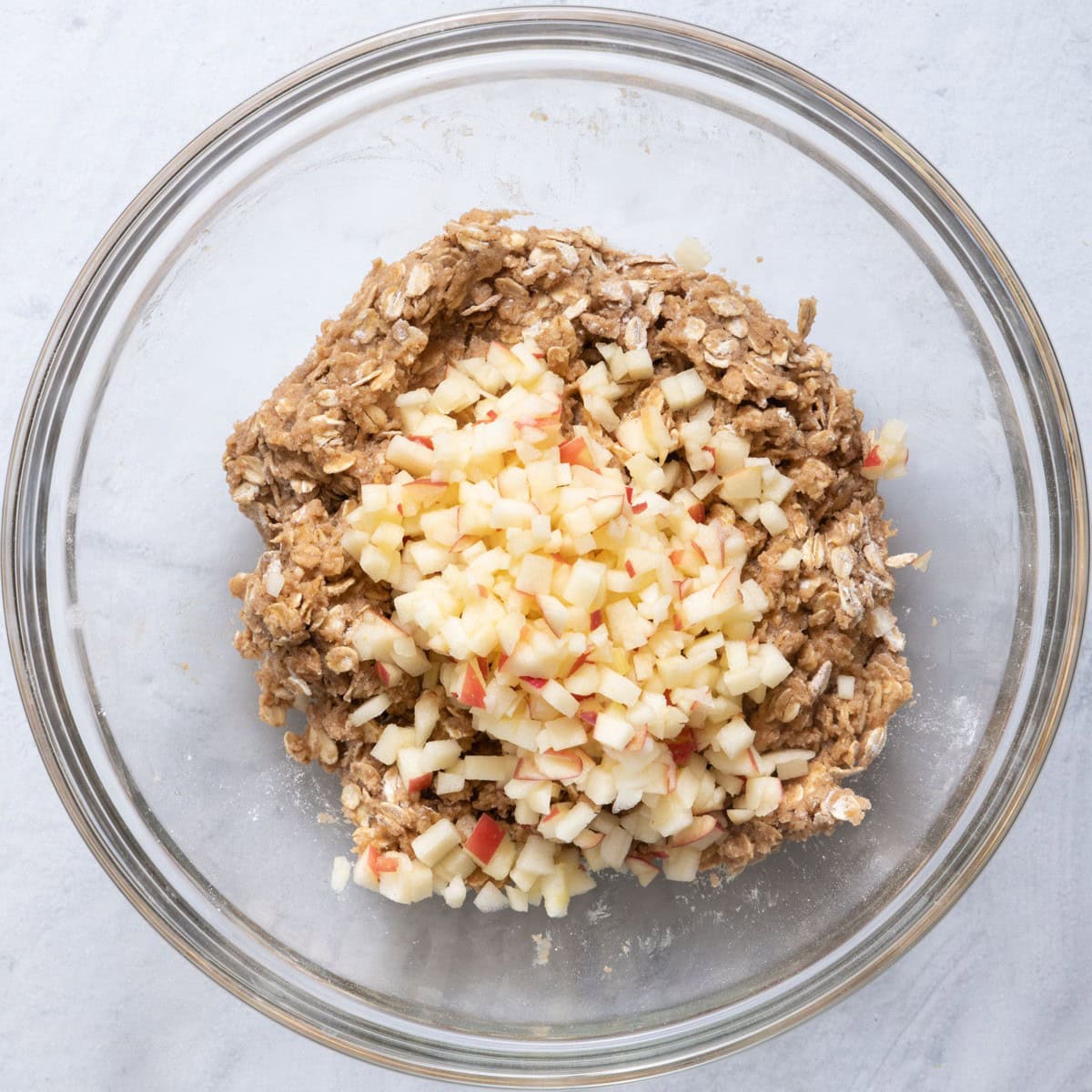 Apple chunks added on top before mixing.
