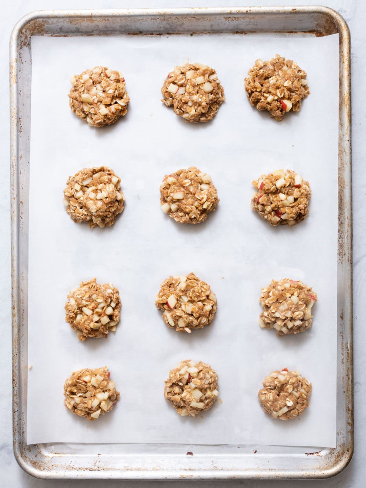 Cookies on cookie sheet before baking.