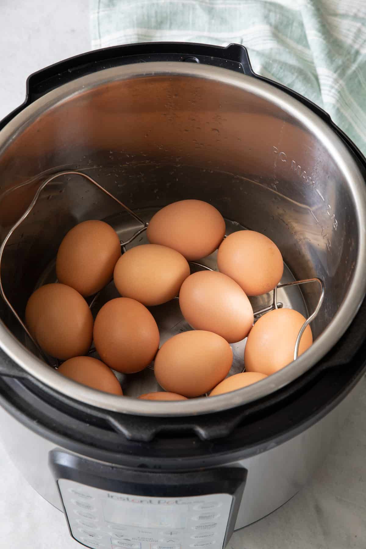 Instant pot with 12 eggs after cooking.
