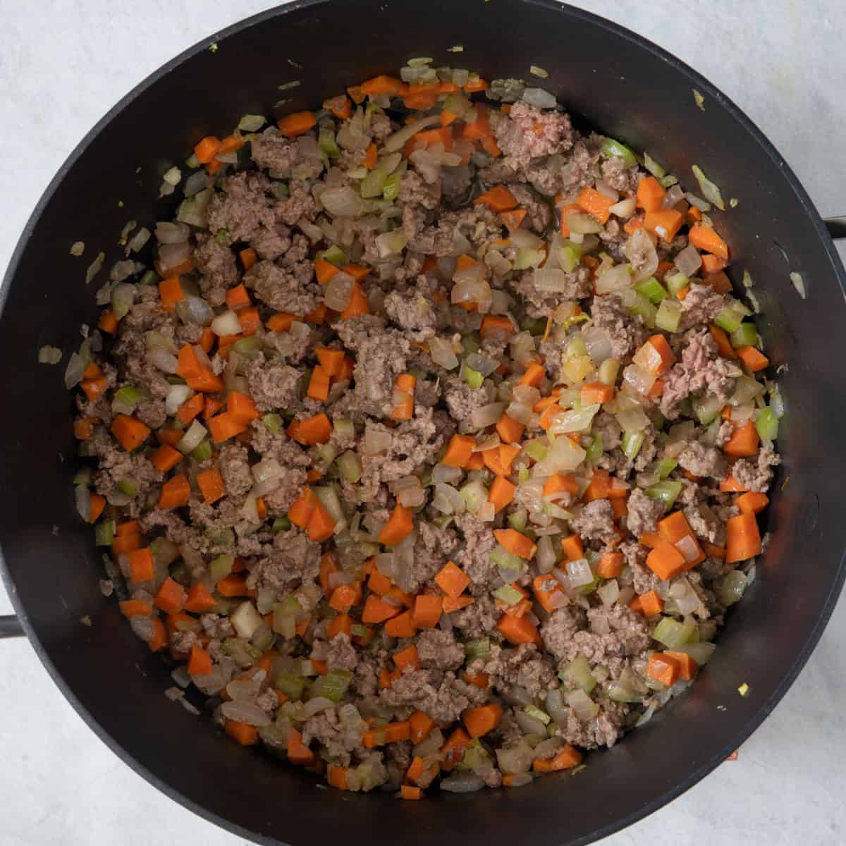 Ground beef cooked with vegetables.