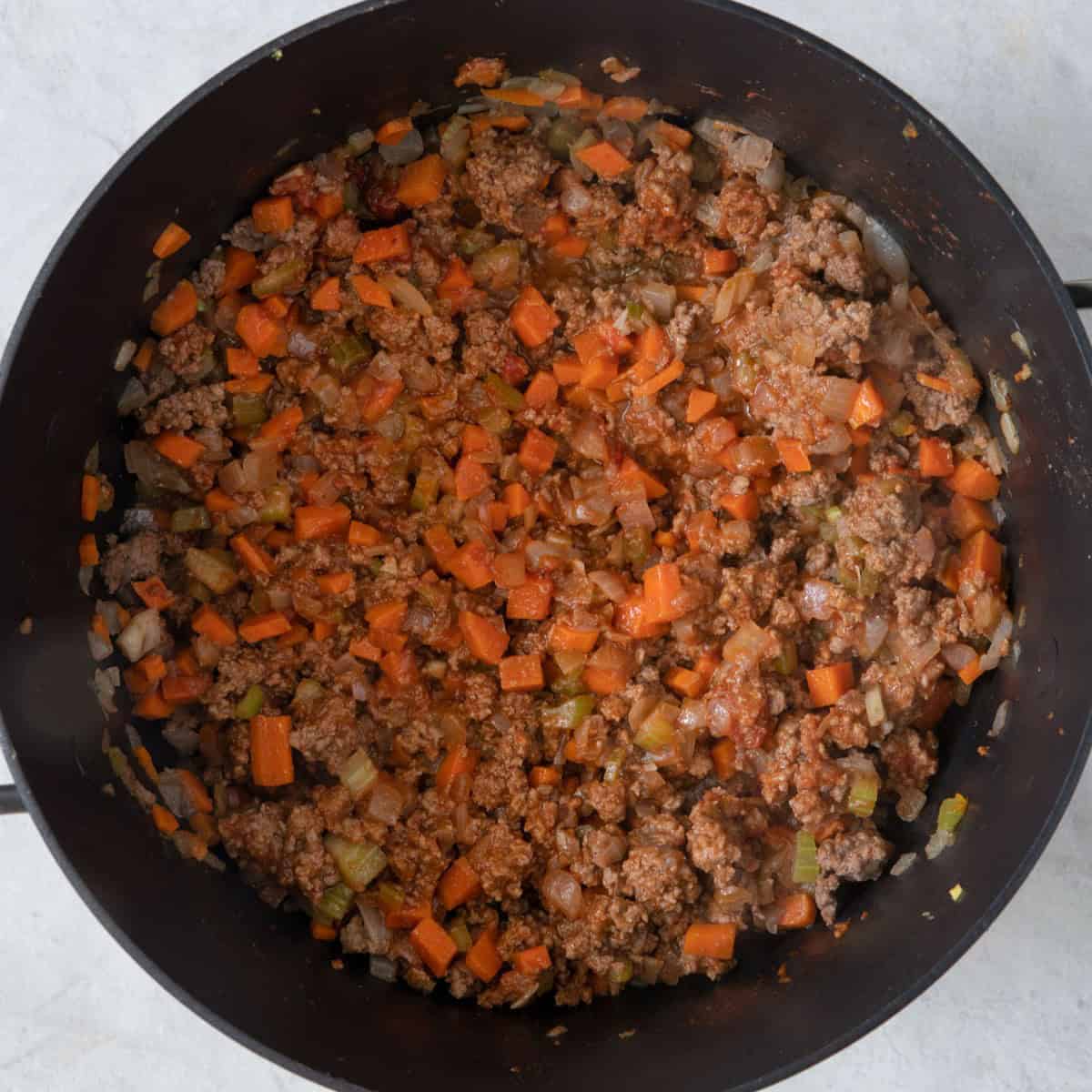 Tomato paste cooked with beef & vegetables.