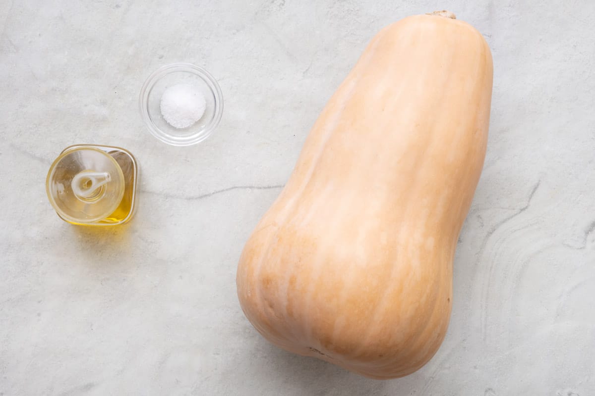 Ingredients for recipe: oil, salt, and a whole butternut squash.