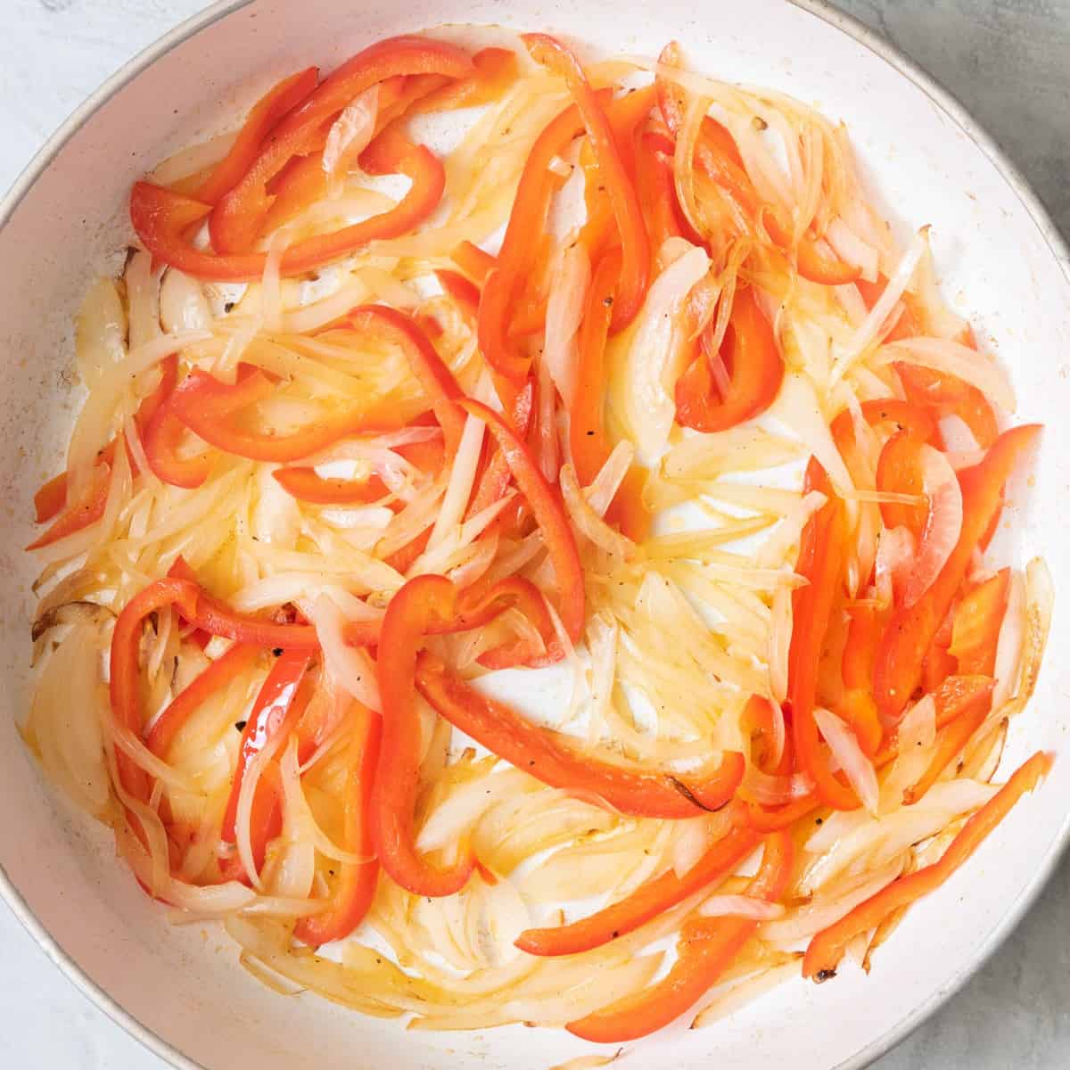 Cooked onions and red peppers.