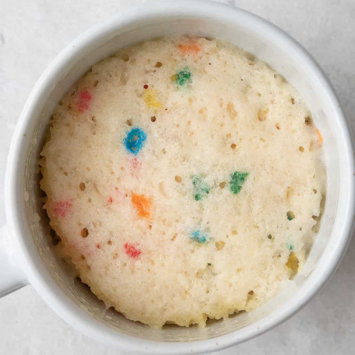 The vanilla mug cake in the mug after cooking.