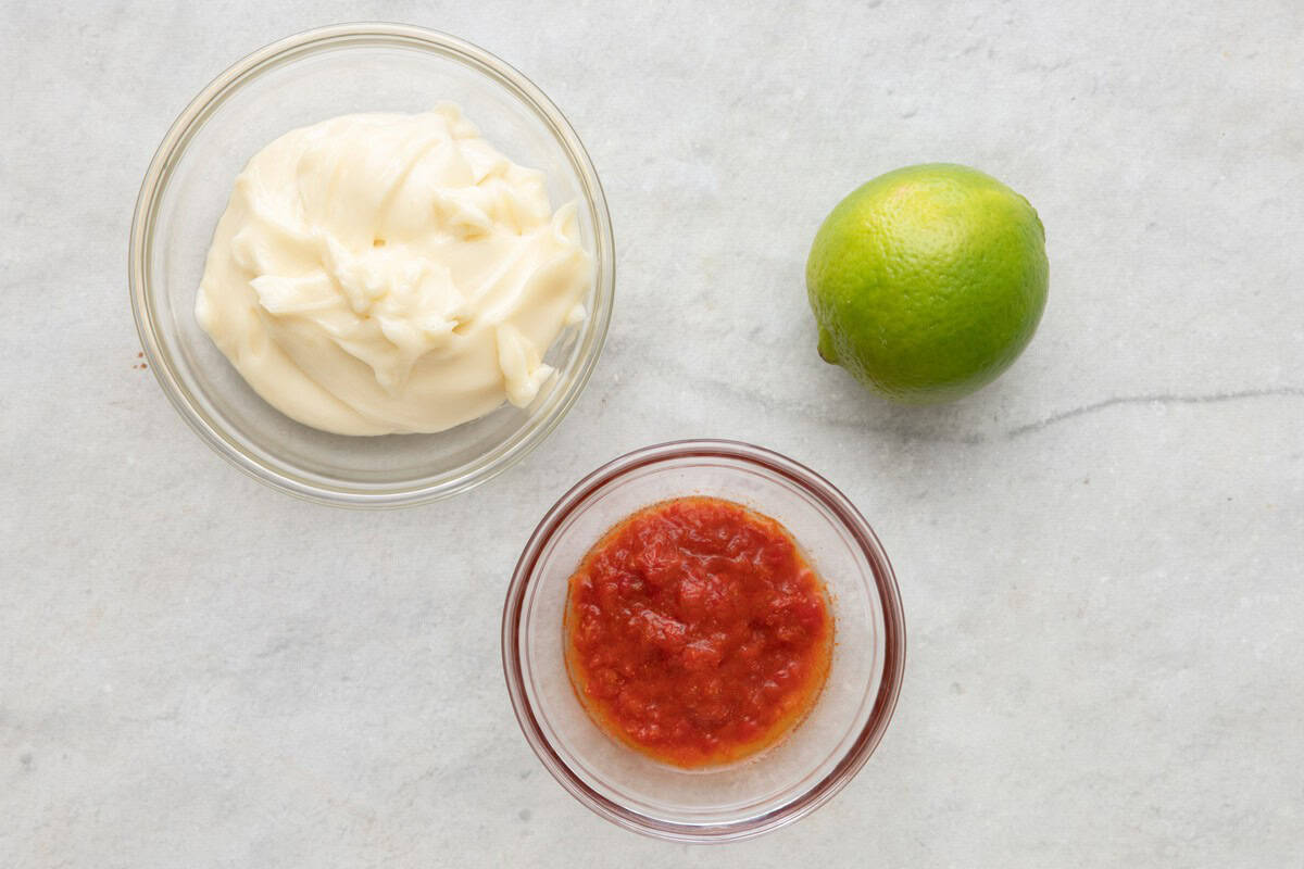 Ingredients to make spicy mayo.