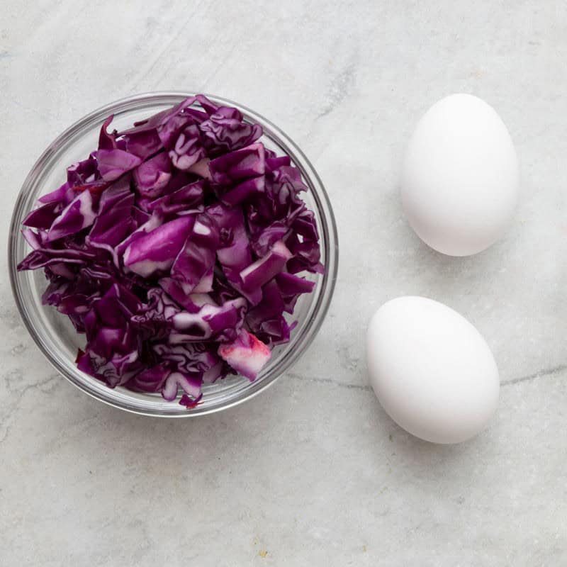 Ingredients to make blue dyed eggs.