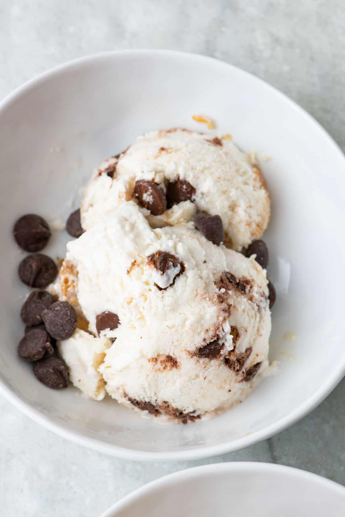 Peanut butter chocolate chip cottage cheese ice crea, in a bowl.