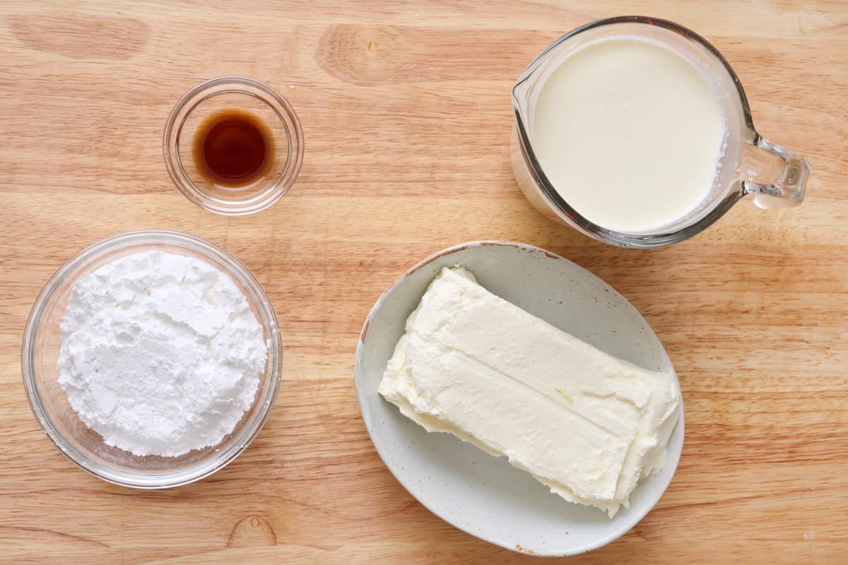 Large bowl with cream cheese, greek yogurt, honey and vanilla extract