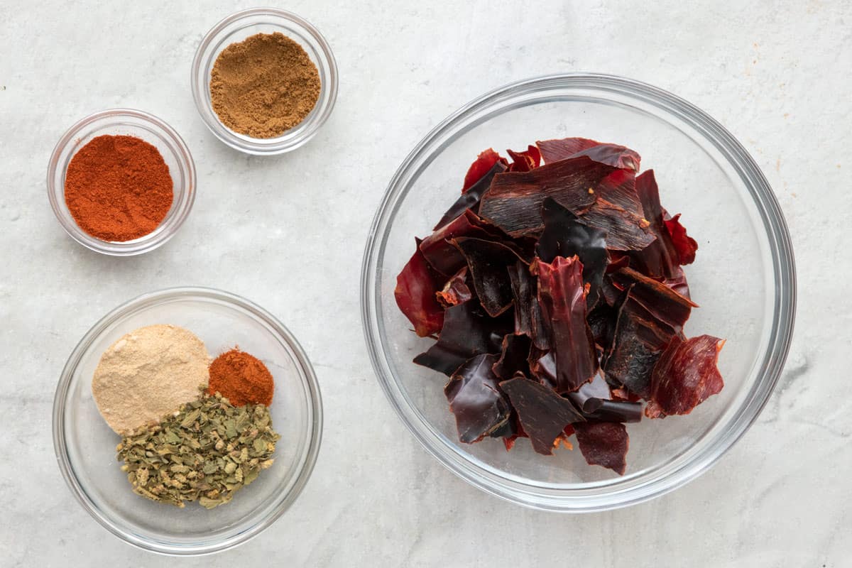 Ingredients for seasoning blend: paprika, cumin, oregano, garlic powder, cayenne pepper, and dried mild red chilis.