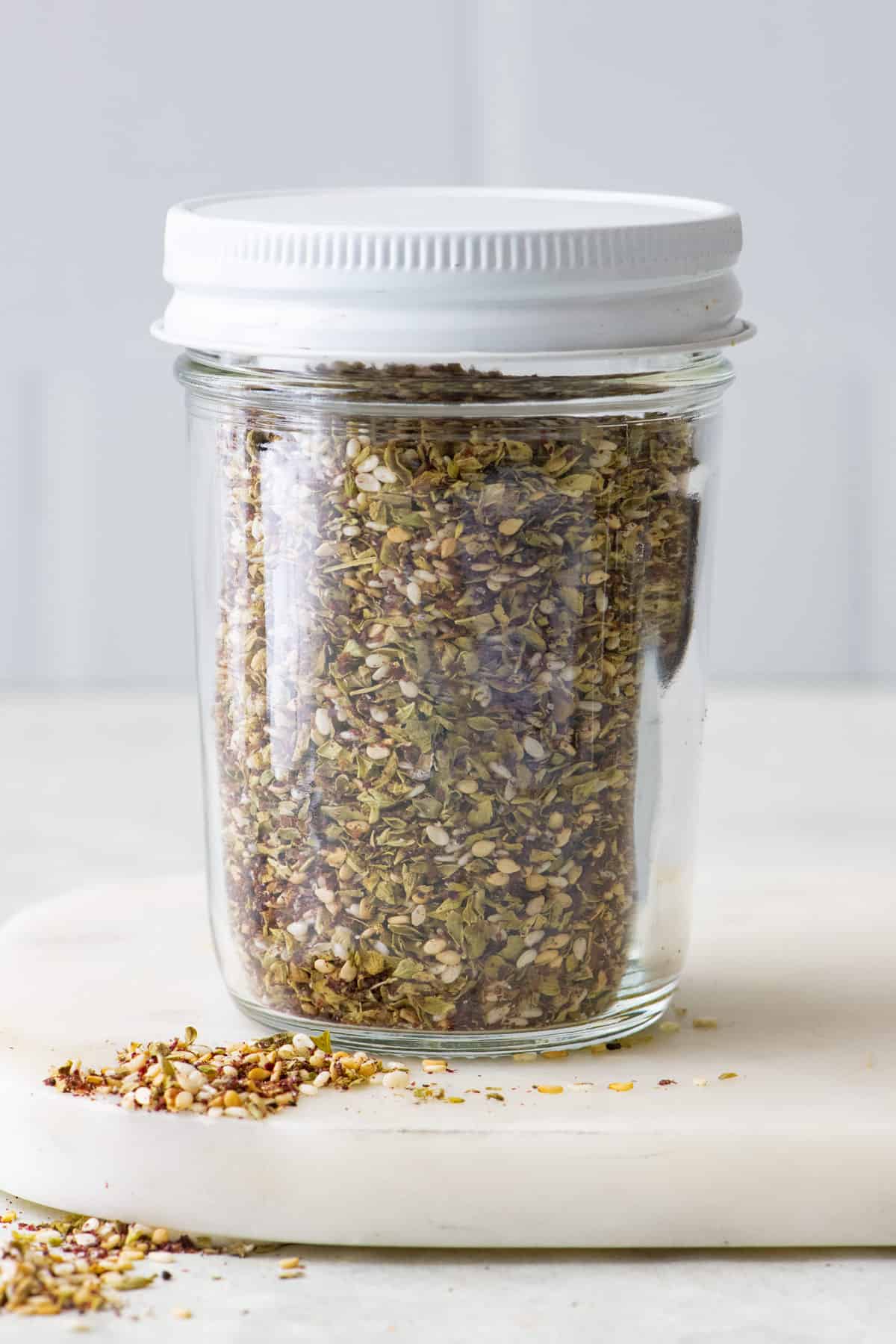 Jar of za'atar seasoning.