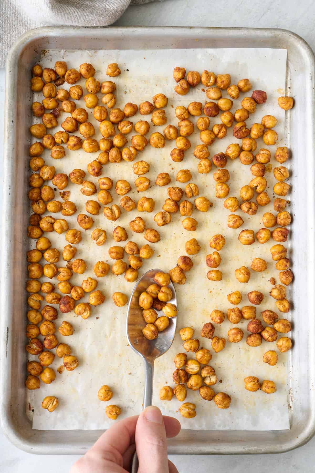4 bowls of roasted chickpeas each with different spices