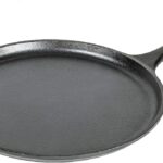 Round cast iron griddle with a red rubber handle.