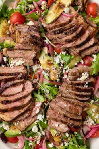Steak salad on a large platter.