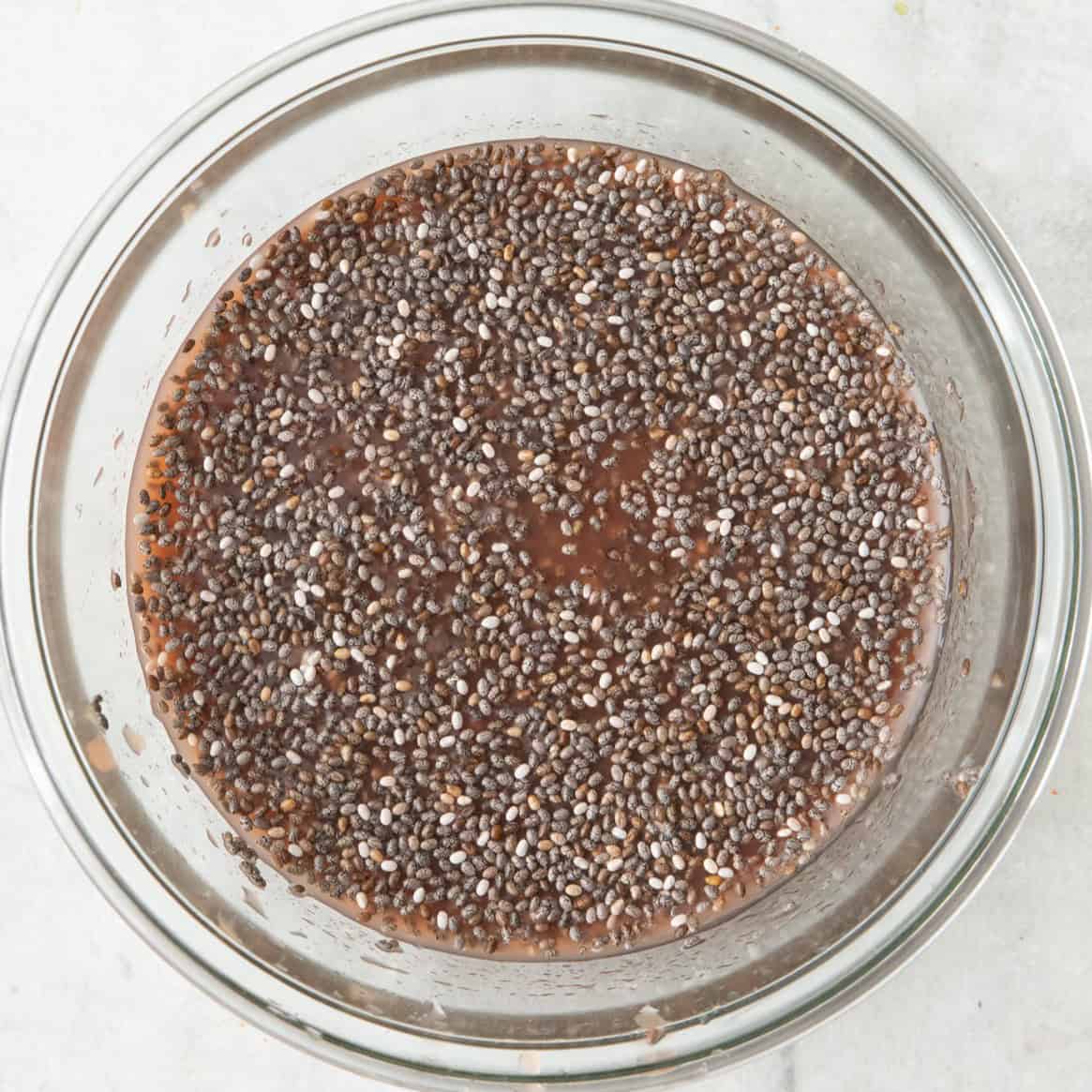 Chia seeds and honey stirred into juice before plumped up and refrigerated.