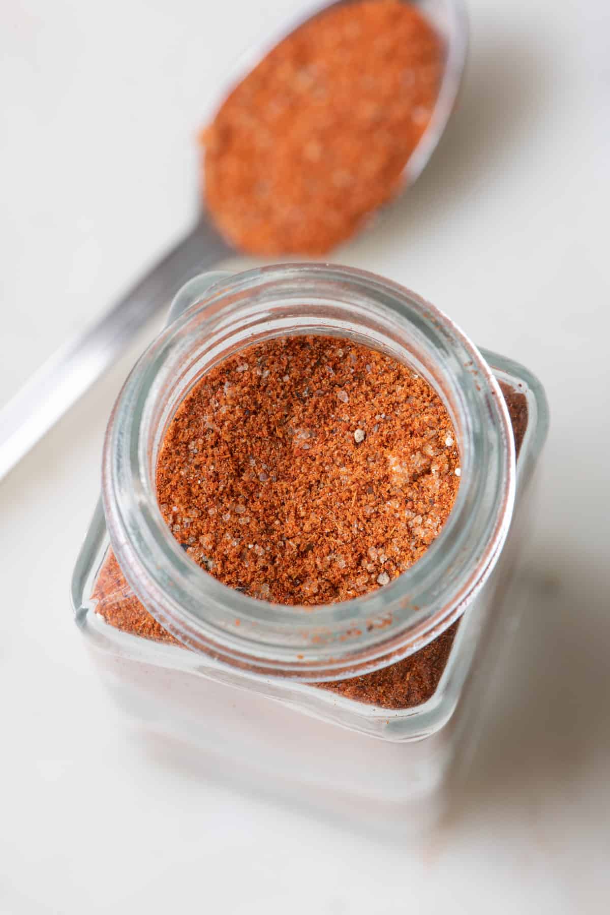 Top down view into a jar with bbq spice blend.