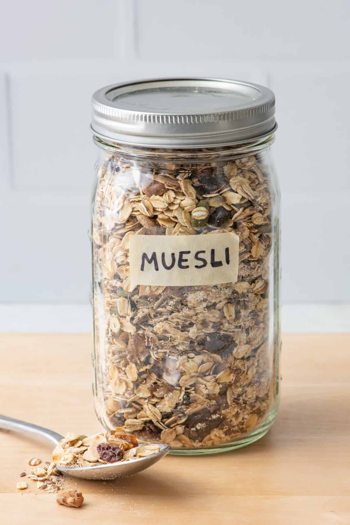 glass jar, dried fruits and nuts are drenched in sweet honey