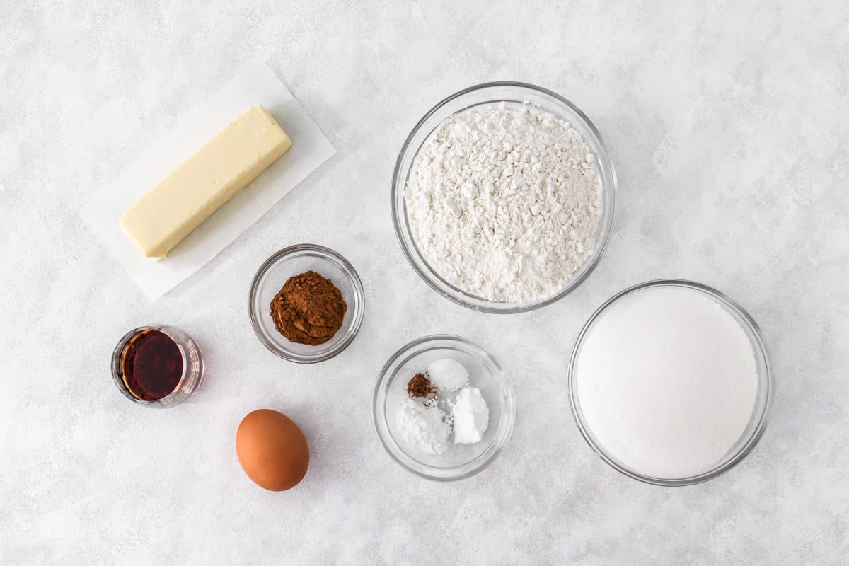 Ingredients for recipe: stick of butter, vanilla, cinnamon, egg, cream of tartar, nutmeg, baking soda, and salt, flour, and sugar.