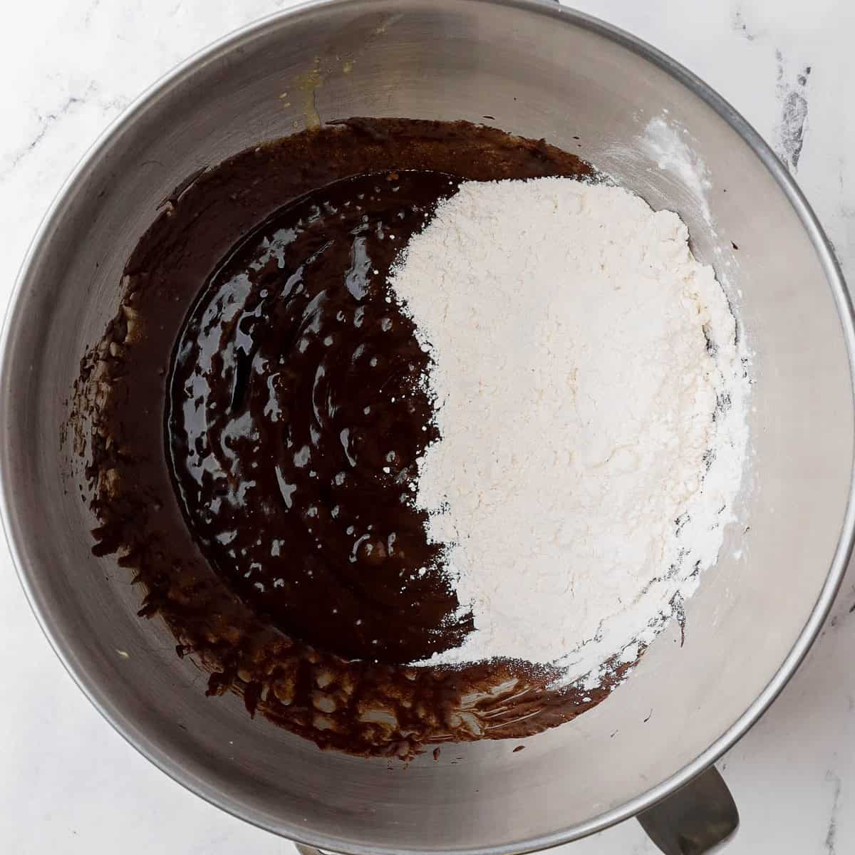 Flour, baking soda, and salt added to the bowl.