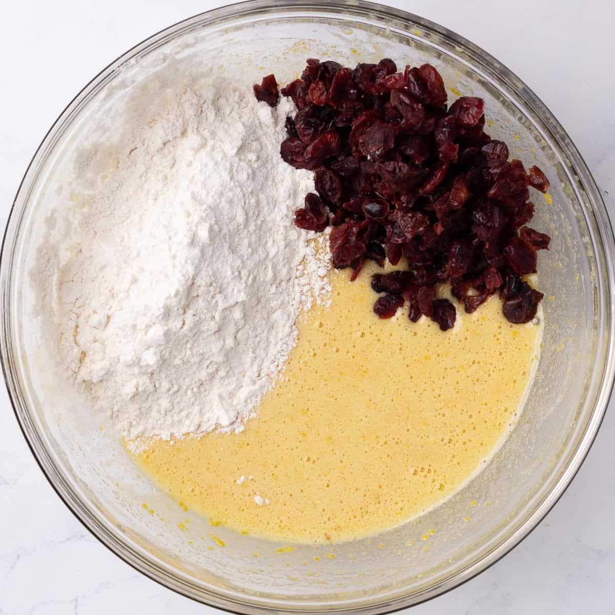 After combining with flour mixture and cranberries added on top.