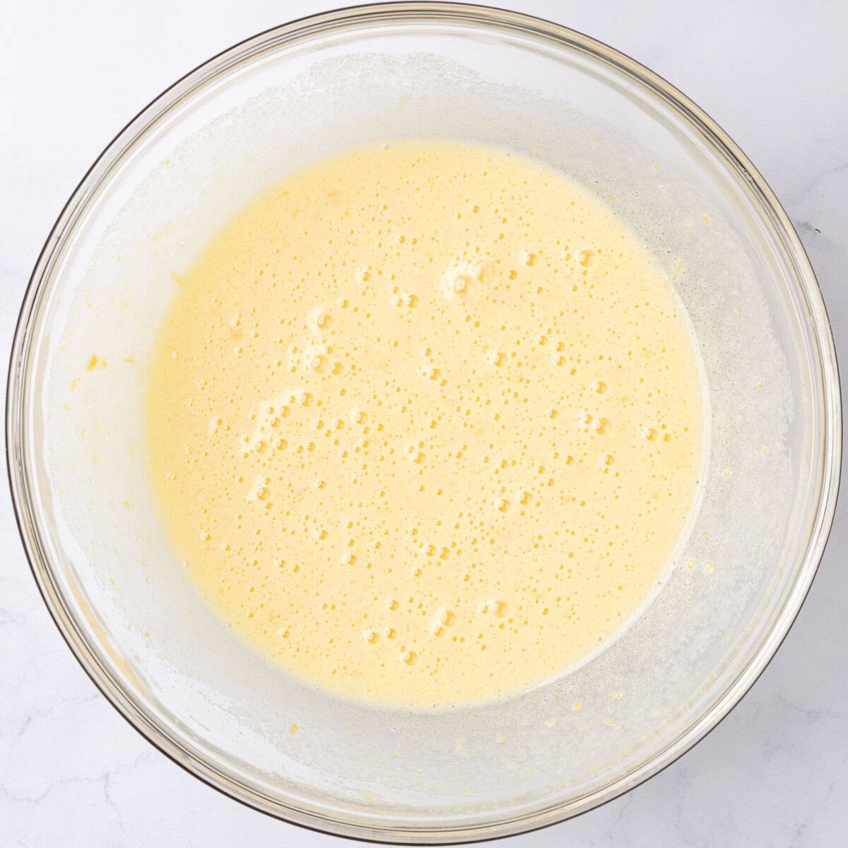 After whisking until pale yellow.