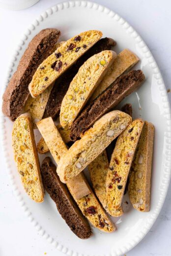 Four biscotti flavors on an oval platter.