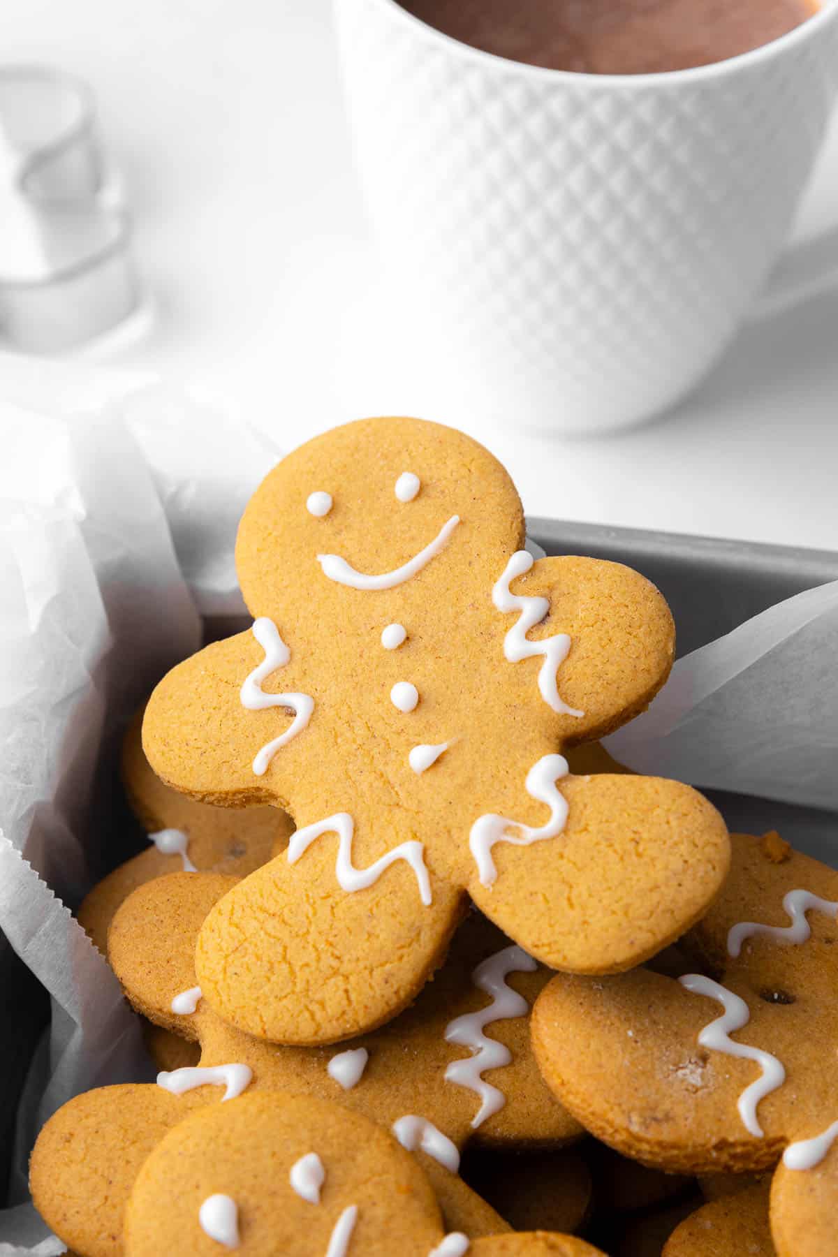 Close up of a gingerbread cookie decorated with icing.
