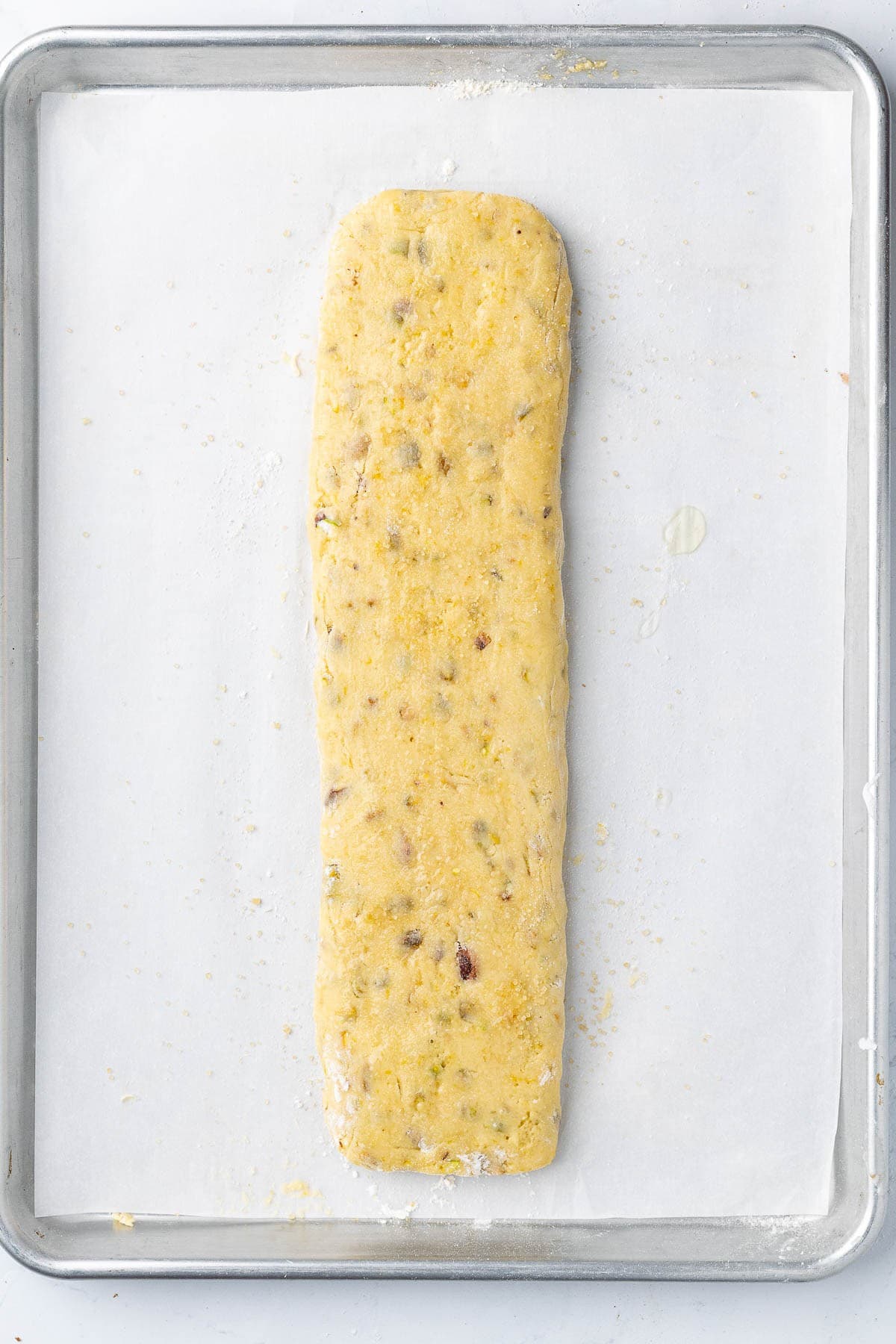 Biscotti before baking egg wash on top and sugar sprinkled on top.