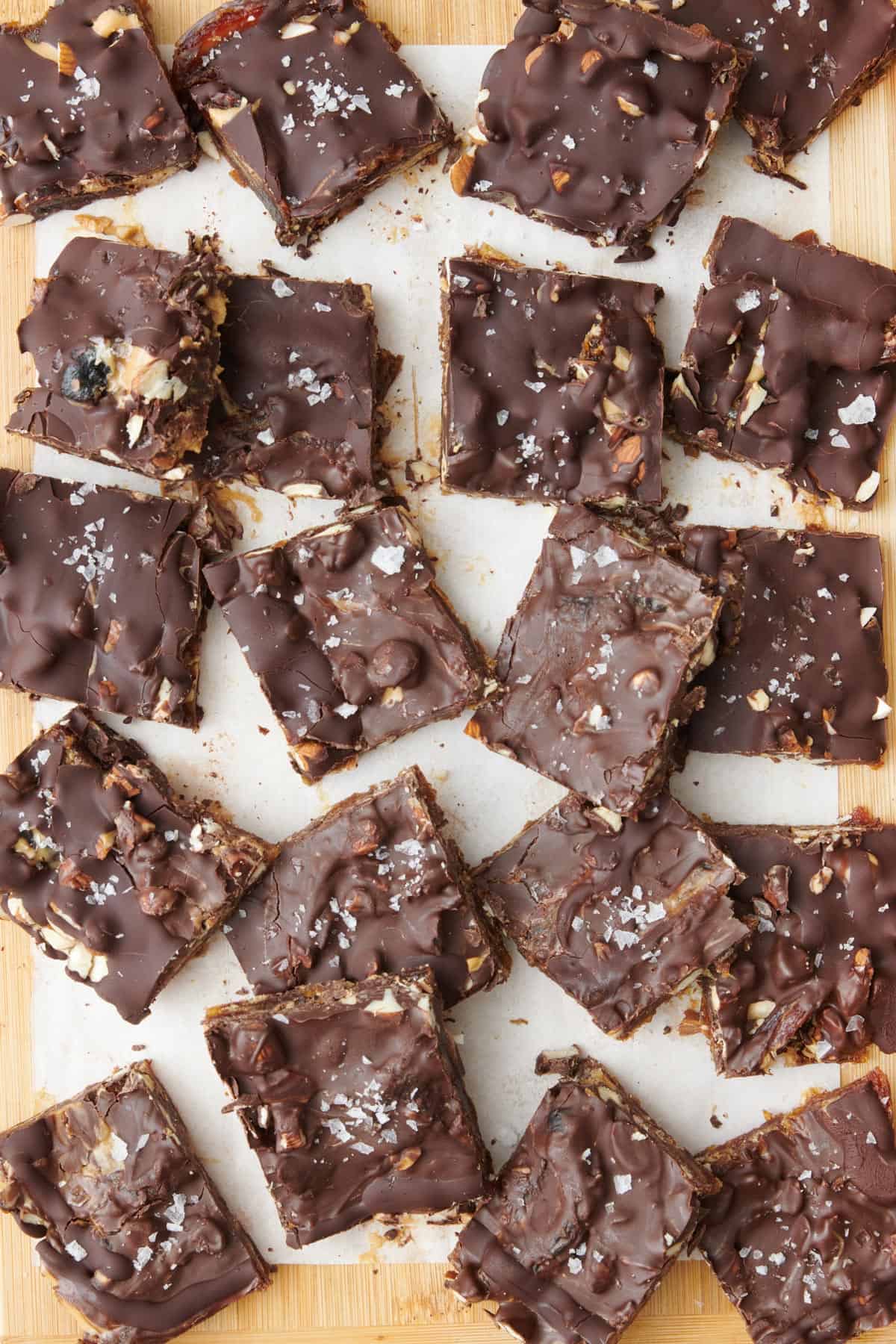 Date bark squares on a cutting board.